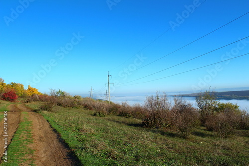 road in the countryside near high voltage lines © Victor