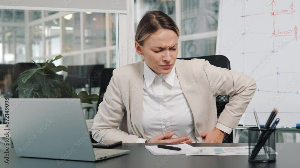 Sick business woman, office worker employee having severe abdominal pain, diarrhea, premenstrual syndrome or poisoning. Female suffering from painful cramp in stomach, bowel syndrome of diet. Sick business woman, office worker employee having severe abdominal pain, diarrhea, premenstrual syndrome or poisoning. Female suffering from painful cramp in stomach, bowel syndrome of diet.