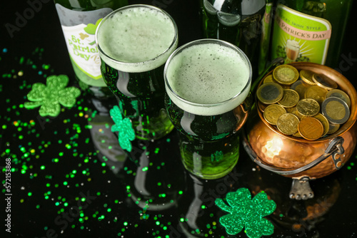 Glasses of beer, pot with c...