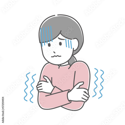震えている女性