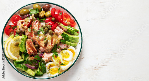 Tuna salad with lettuce, eggs and tomatoes.