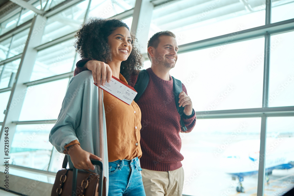 Travel, airport and happy couple with ticket or boarding pass for international flight for holiday destination together. Smile, woman and man with visa for travelling to foreign country for vacation.