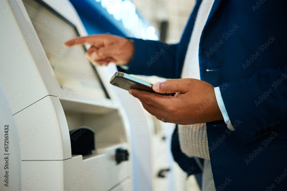 Hand, phone and atm with a business black man at the bank to withdraw cash from a convenient machine. Money, finance and smartphone with a male employee making a financial transaction on credit