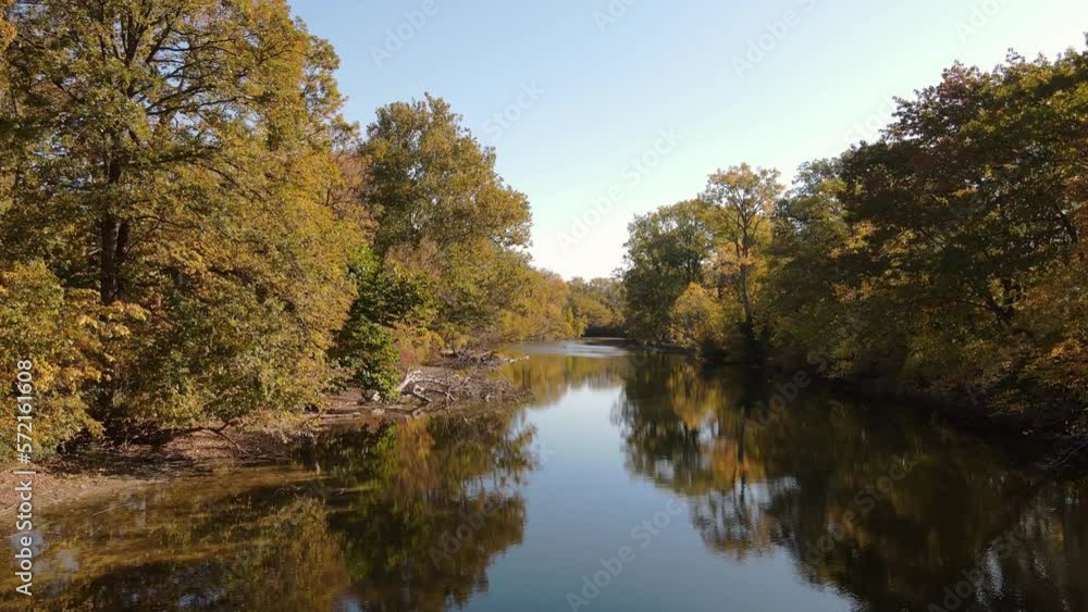 Sunny autumn day in Oakwoods Metro Park with Huron River, Wayne County Michigan, USA Sunny autumn day in Oakwoods Metro Park with Huron River, Wayne County Michigan, USA