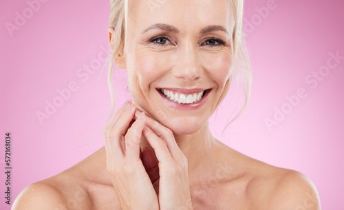 Dental, teeth and portrait of woman with smile, glowing skin and natural makeup in studio. Mockup, advertising and skincare, luxury cosmetics, face of happy beauty model isolated on pink background.
