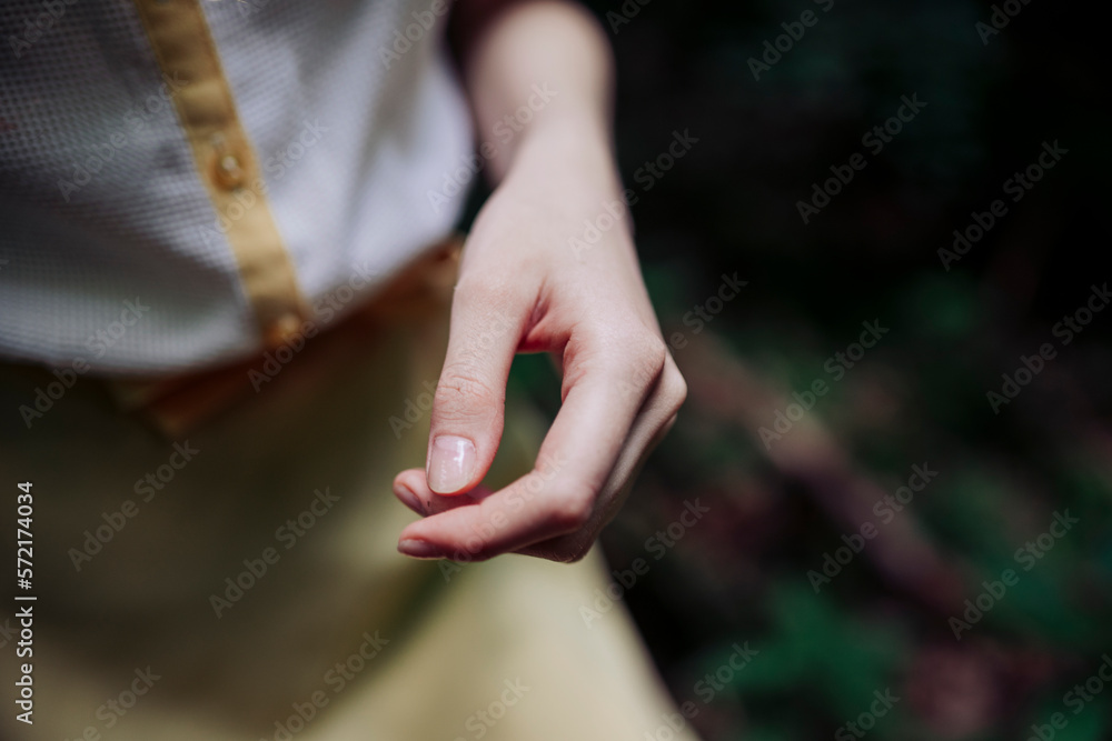 hand of a young woman close up hand of a young woman close up