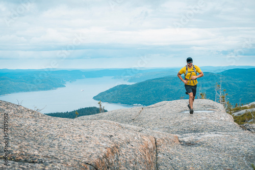 Trail Runner with Saint Lawrence in Background photo