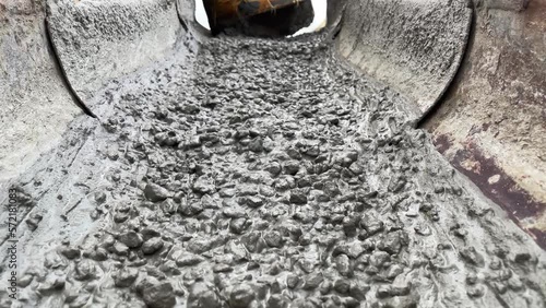 Pouring concrete mix on concreting formwork. Slow Motion
