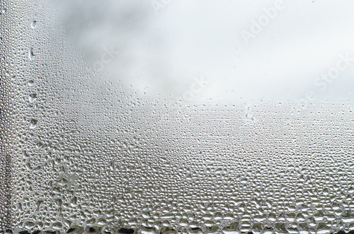 Texture of water drop on glass.