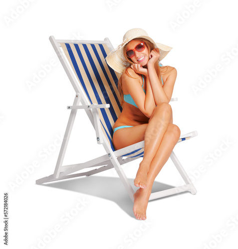 Photography Happy woman sunbathing on a deckchair
