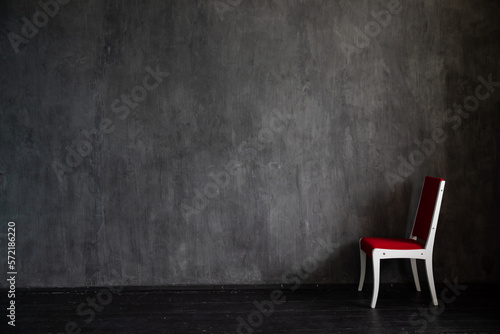 red chair in a dark room interior furniture
