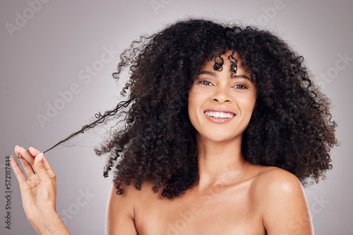 Hair in hands, wellness and portrait of black woman for beauty, natural growth and curly style. Salon aesthetic, luxury cosmetics and happy girl smile holding strand for keratin treatment results