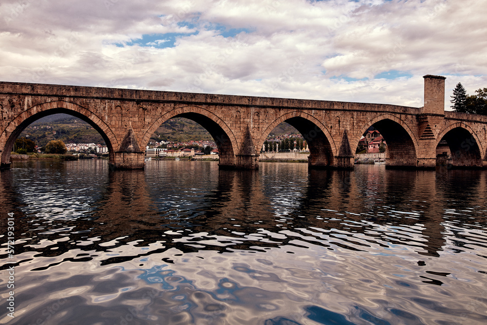 Fototapeta premium Bridge on river Drina, famous historic Ottoman architecture in Visegrad, Bosnia and Herzegovina.