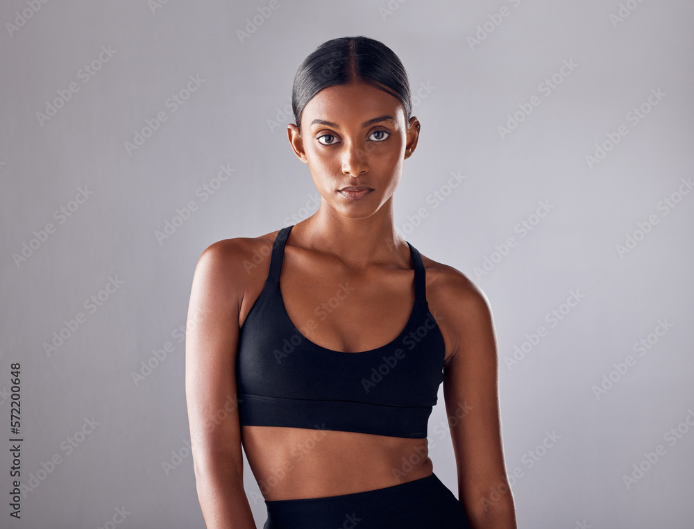 Fitness, motivation and health with portrait of indian woman for training,  workout and wellness goals. Exercise, diet and mindset with girl athlete  for mission, cardio and sports in studio background Photos