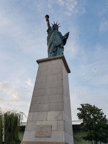 Statue of Liberty at île aux Cygnes island in Paris, France photo