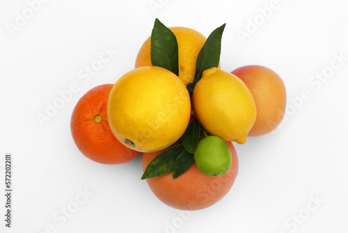 Different citrus fruits and leaves on white background, top view