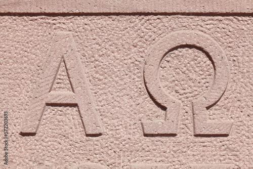 Buchstabe A und Symbol des Todes an einer Hauswand,  Symbol der Alchemie, Deutschland photo