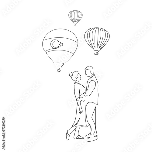 Romantic, hugging couple standing face to face. Hot air balloons in the background. Cappadocia, Turkey. One line art. Vector illustration.