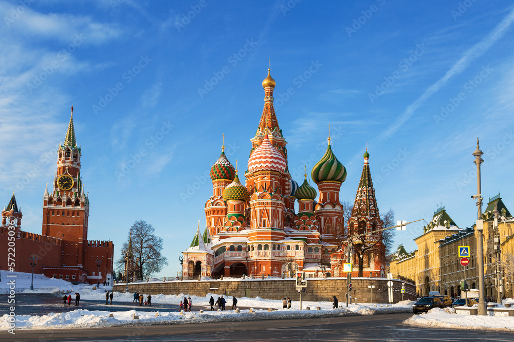 Winter Moscow. Vasilevsky Descent with  St. Basil's Cathedral, the Kremlin and the Spasskaya Tower on a sunny winter day. Russia
