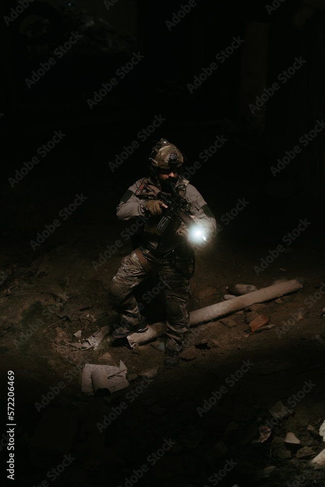 Military soldier in the war. Concept of military special forces with arms Military soldier in the war. Concept of military special forces with arms