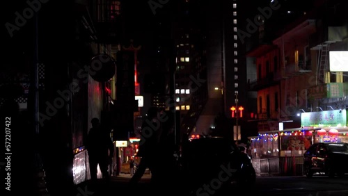 Moody night scene tilt down in Chinatown.  San Francisco, CA. Slow motion 60fps.