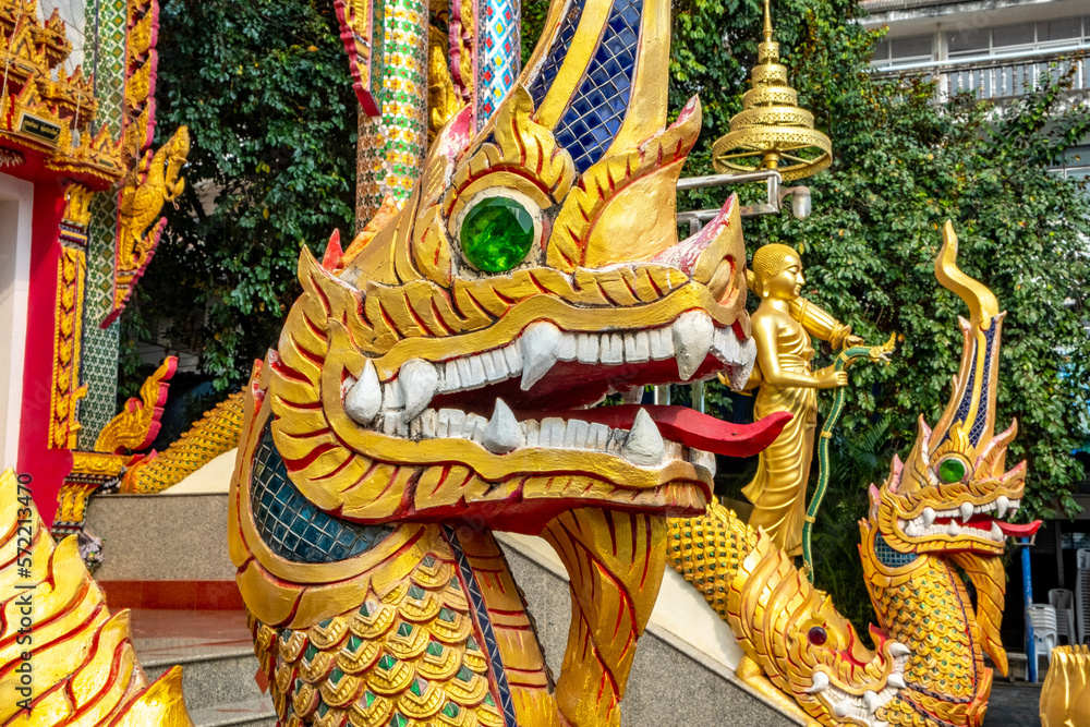 Fototapeta premium Golden statue at a Buddhist temple in Mae Sot Thailand