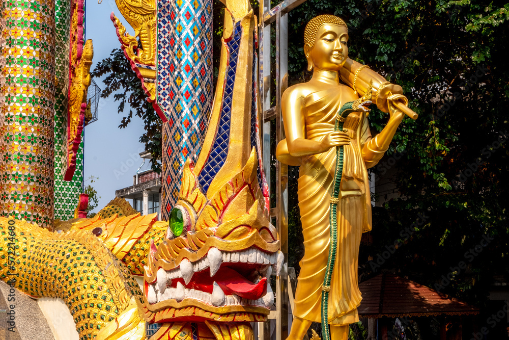 Fototapeta premium Golden statue at a Buddhist temple in Mae Sot Thailand