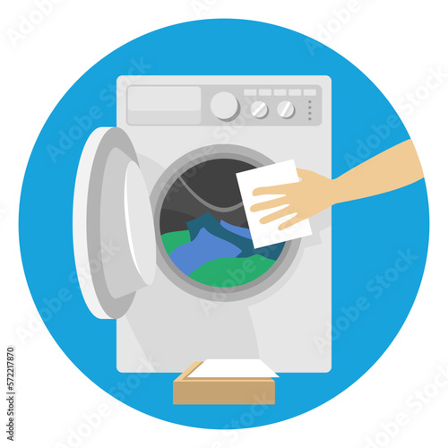 Laundry detergent sheets in hand and washer