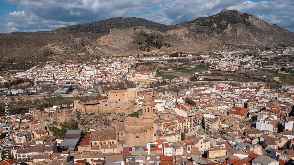Aerial photo from drone to city of Loja and Church of the Incarnation with Moorish Alcazaba and Gorda Peak at Loja ,Granada, Andalusia, Spain, Europe (Series)