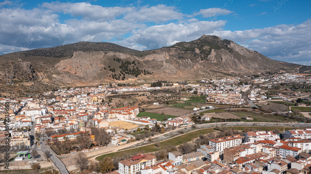 Aerial photo from drone to city of Loja and Church of the Incarnation with Moorish Alcazaba and Gorda Peak at Loja ,Granada, Andalusia, Spain, Europe (Series)