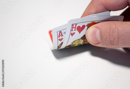 an a's of hearts and a king of hearts during a game of poker