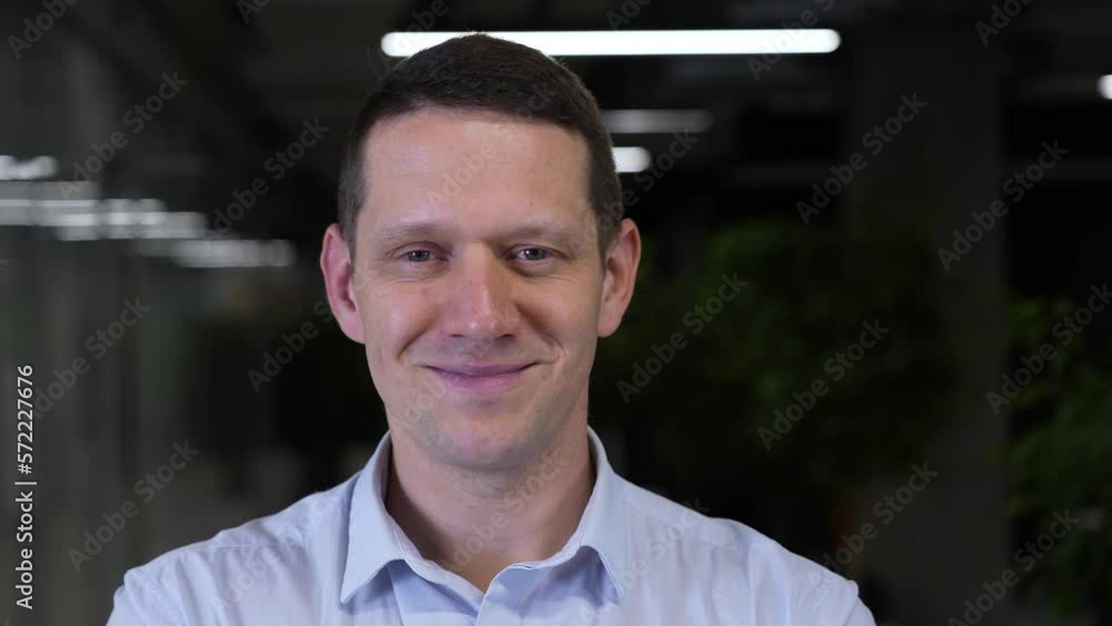 Close-up portrait of caucasian smiling man indoors. Close-up portrait of caucasian smiling man indoors.