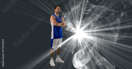 Composition of male basketball player with arms crossed with copy space