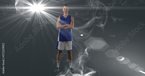 Composition of female basketball player with arms crossed with copy space © vectorfusionart