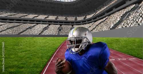 Composition of male american football player holding ball over sports stadium