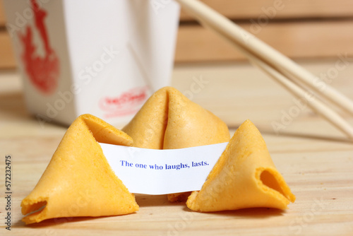 Fortune Cookie With Message The one who laughs, lasts