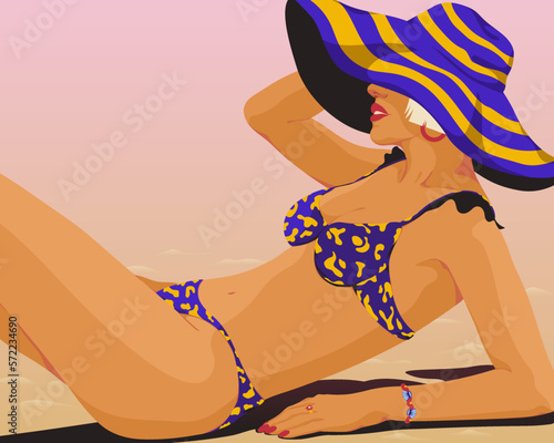 Woman laying on the beach in a matching bikini and floppy hat
