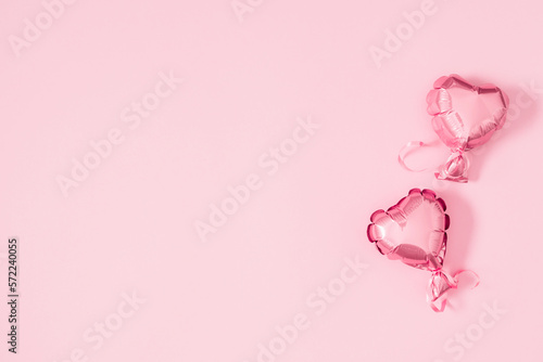 Valentine's Day background. Heart shaped balloon on pink background. Valentines Day. Balloon Heart. Flat lay, top view, copy space 