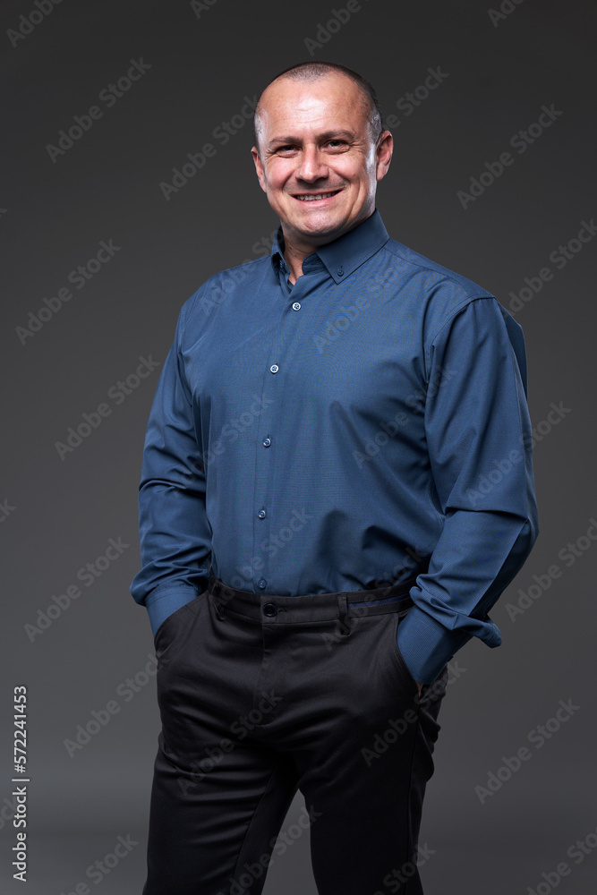 Fototapeta premium Businessman with hands in his pockets