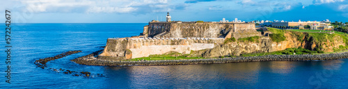A panorama view over the fortifications at the harbour entrance in San Juan, Puerto Rico on a bright sunny day photo