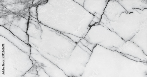 White crystal marble texture background with black curly veins. White quartz stone granite crack veins. Calacatta statuario natural stone marble granite for ceramic slab tile, wall tile, flooring. photo