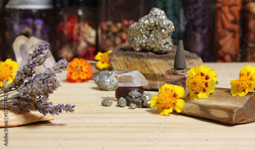 Dried Lavender on Palo Santo Sticks With Crystals and Flowers in Background