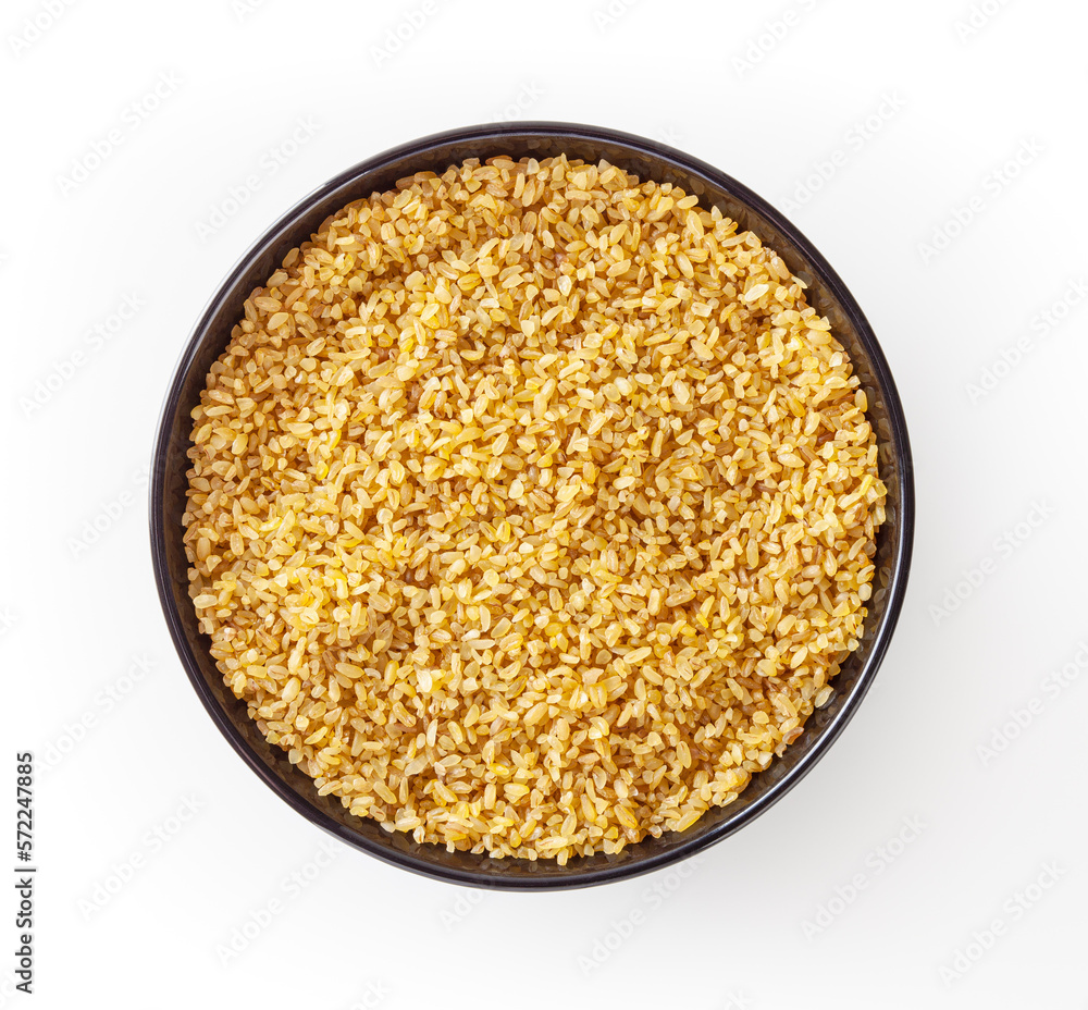 Dried bulghur in blak bowl isolated on white background with clipping path Dried bulghur in blak bowl isolated on white background with clipping path
