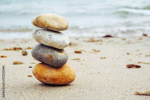 stack of stones on beach. balance and stability concept