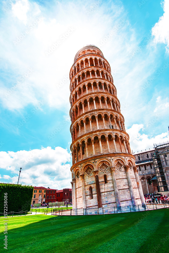 Picturesque landscape with church and famous sloping tower in Pisa, Italy. fascinating exotic amazing places.