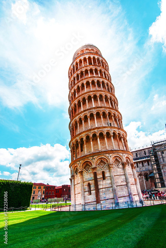 Obraz na płótnie Picturesque landscape with church and famous sloping tower in Pisa, Italy. fascinating exotic amazing places. w salonie