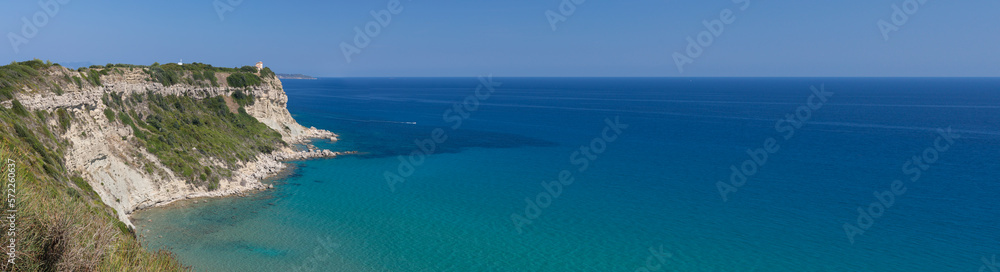 Beautiful beach on the Greek island of Corfu, blue lagoon, natural colours. Panoramic shot for banner.