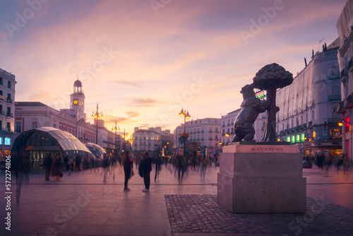 City square with statues and buildings photo