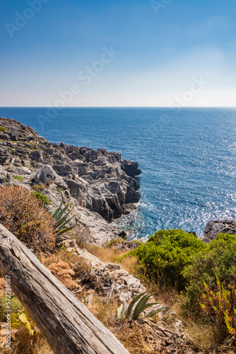 Gagliano del Capo. The beautiful panorama on the blue sea, from the rocky cliff of Salento. The nature trail that leads from the Ciolo bridge to the spectacular Cipolliane caves. Sunny day in summer.