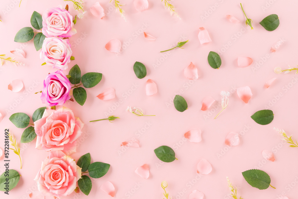 Happy Women's Day decoration concept made from rose flower to make frame on pastel background. Happy Women's Day decoration concept made from rose flower to make frame on pastel background.